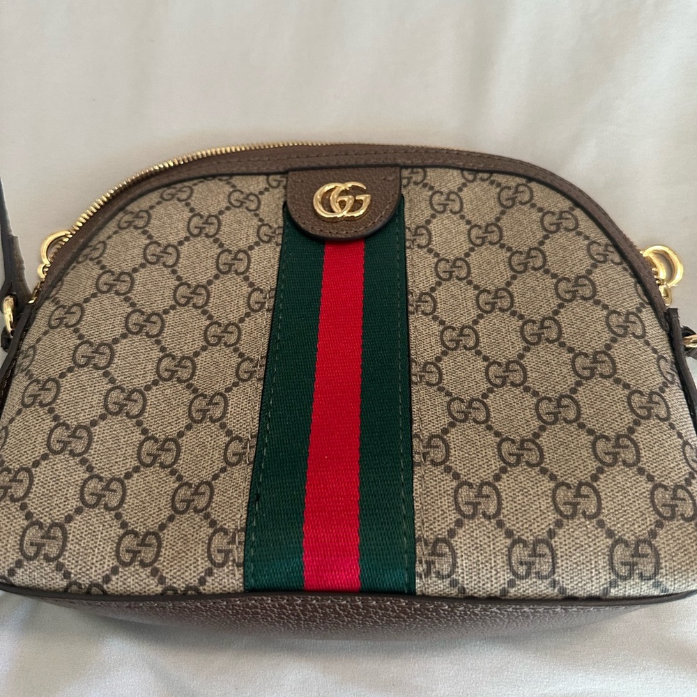 Cross body GG bag 9” wide 71/2” length, strap adjustable to  22”